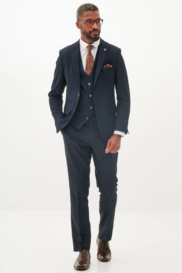Navy Suit - Navy suit with a dress shirt and tie – a timeless choice.